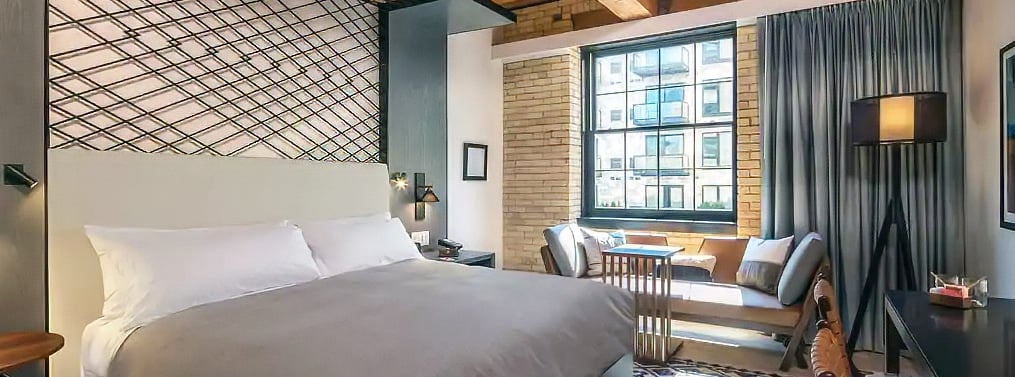 Blue and Beige Themed Hotel Room
