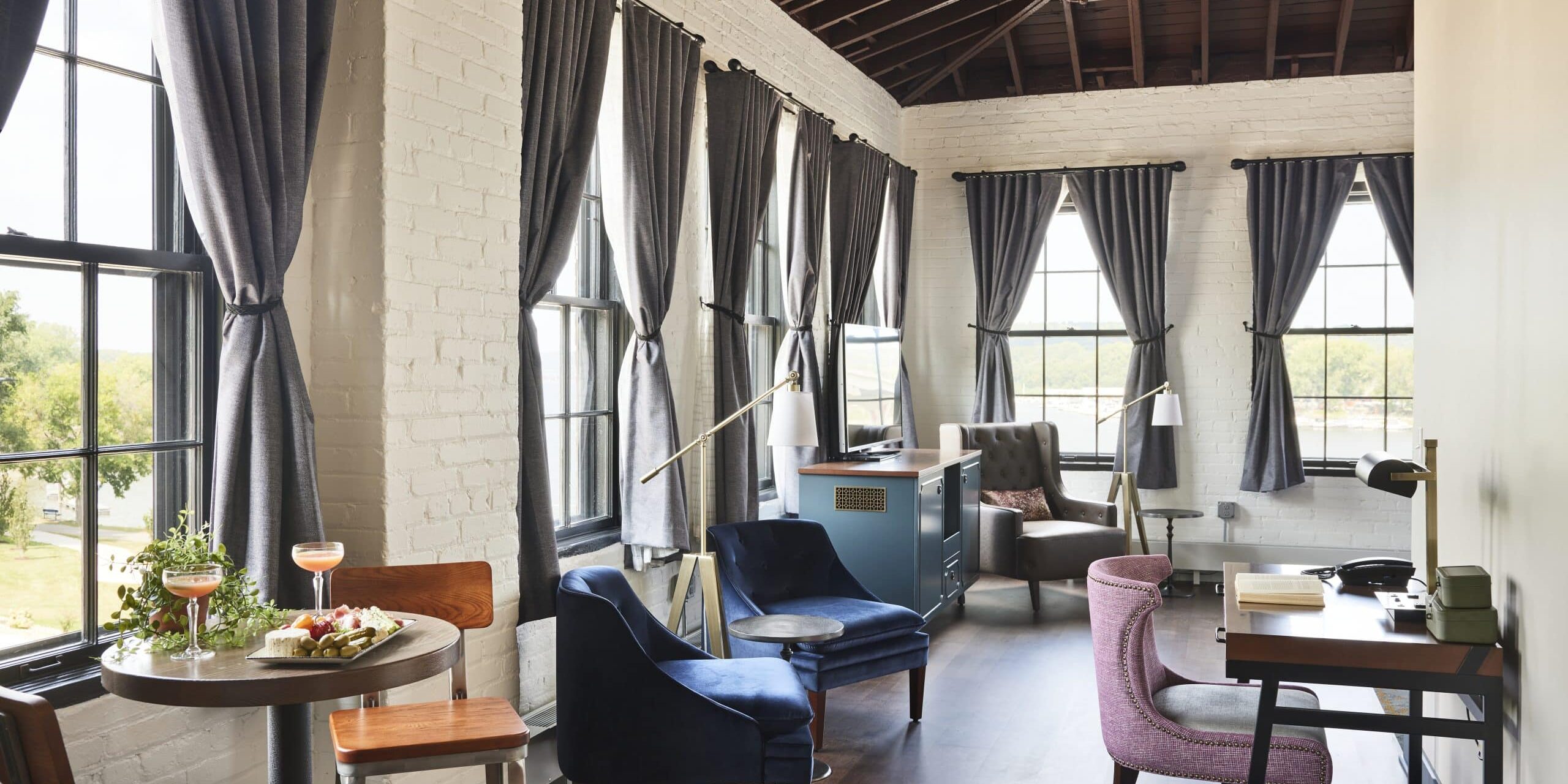 dining room with grey curtains
