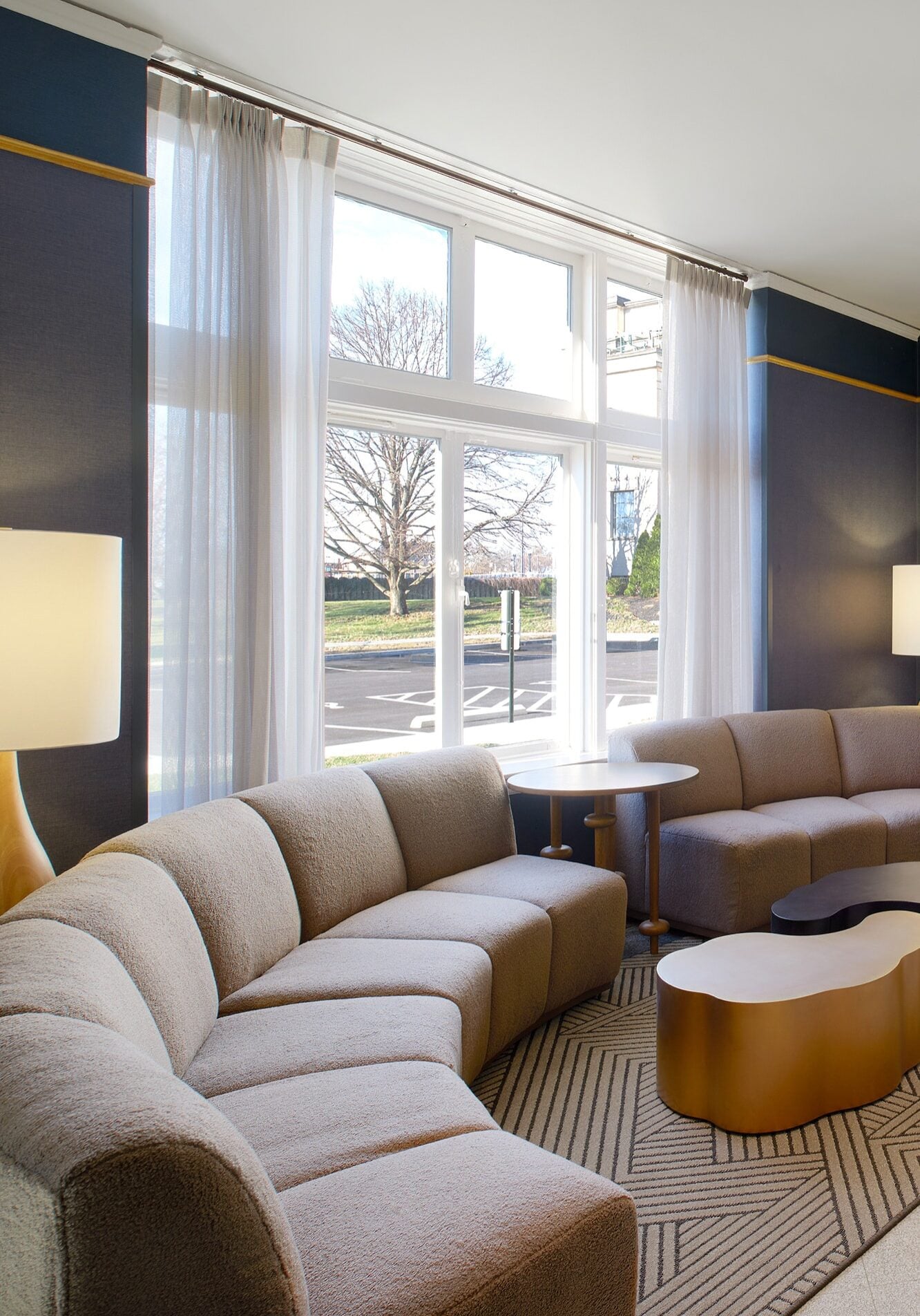Hotel Lobby with Rounded Couch and Curtains
