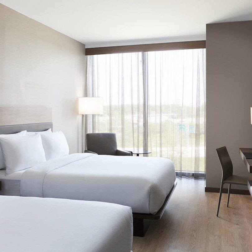 white and brown hotel room